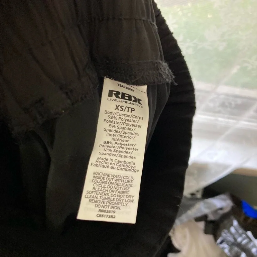 Black workout women's mini skirt with pockets RBX XS NWT